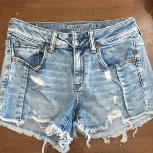 Distressed denim shorts
